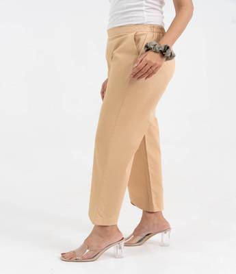 Beige cotton  solid pant with leaf bottom 4