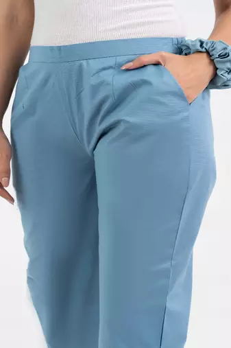 Light blue cotton  solid pant with leaf bottom