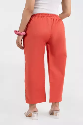 Peach cotton  solid pant with leaf bottom