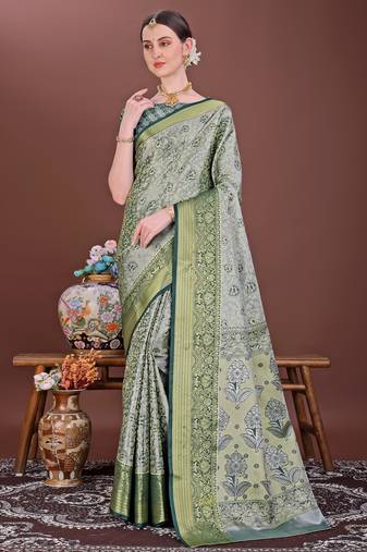Dark green zari woven silk blend saree