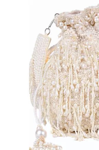 Nayera ivory suede pearl potli