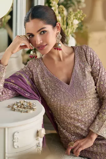 peplum style purple georgette suit set for women 
