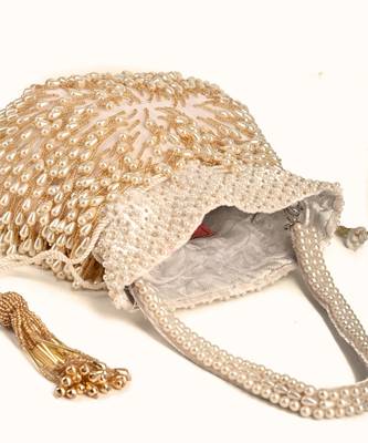 Adara ivory suede potli with pearl gold hanging 3