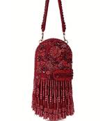 Azmat maroon suede embellished capsule bag