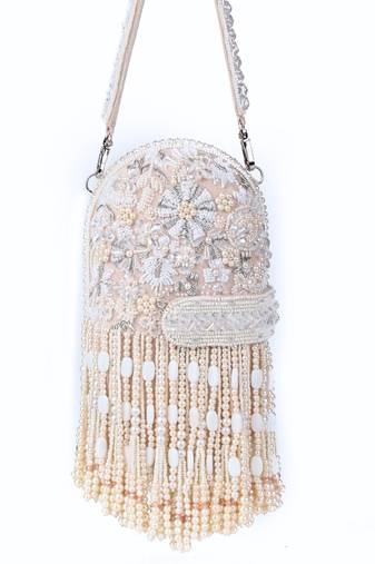 Azmat ivory suede embellished capsule bag