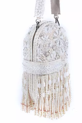 Azmat ivory suede embellished capsule bag