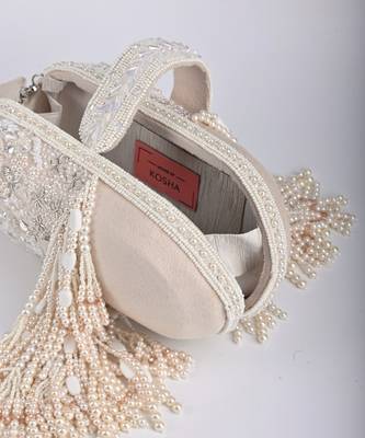 Azmat ivory suede embellished capsule bag 3
