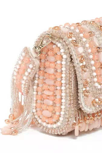 Noor pastel-colour suede embellished clutch
