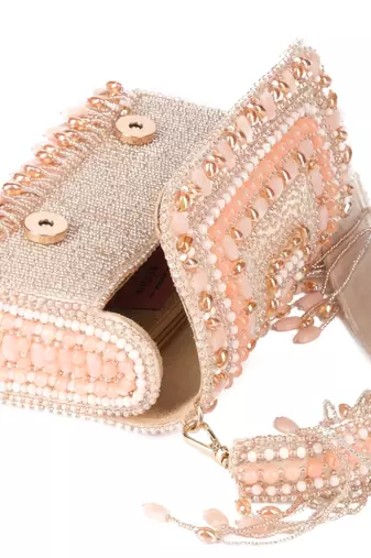 Noor pastel-colour suede embellished clutch