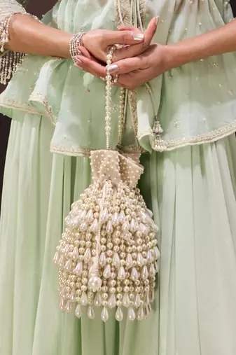 Zarah ivory pearl suede bucket bag