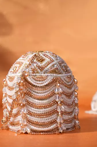 Evara gold georgette embellished bucket bag