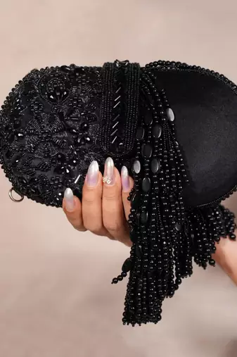 Azmat black suede embellished capsule bag