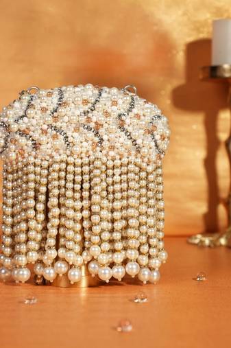 Chloe ivory suede clutch with big pearl hanging