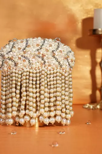 Chloe ivory suede clutch with big pearl hanging
