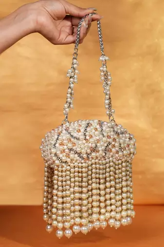 Chloe ivory suede clutch with big pearl hanging