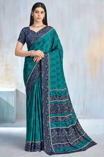 Teal green paisley floral printed crepe saree with printed unstitch blouse