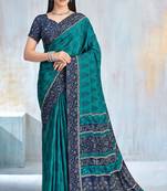 Teal green paisley floral printed crepe saree with printed unstitch blouse