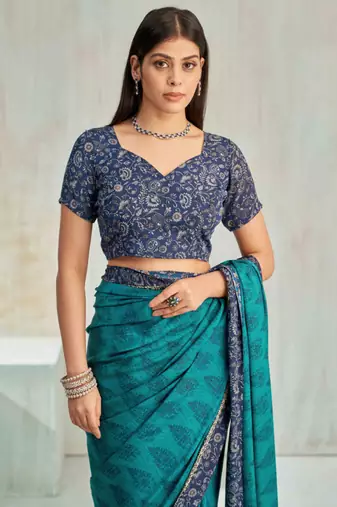 Teal green paisley floral printed crepe saree with printed unstitch blouse