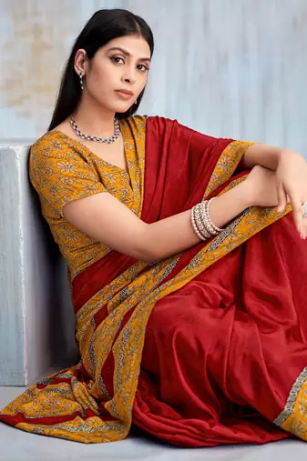 Red paisley floral printed crepe saree with printed unstitch blouse
