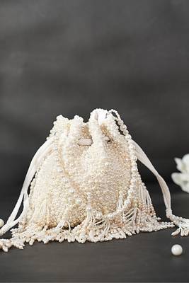Emma ivory suede pearl embellished potli 1