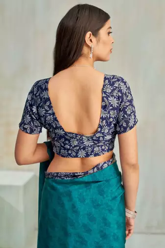 Teal green paisley floral printed crepe saree with printed unstitch blouse