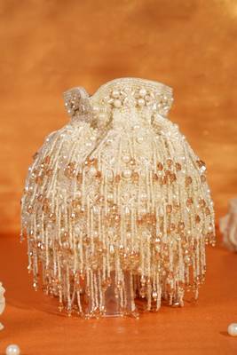 Nayera ivory suede pearl potli with crystals 1