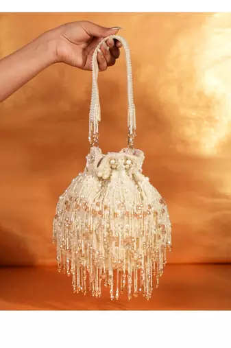 Nayera ivory suede pearl potli with crystals
