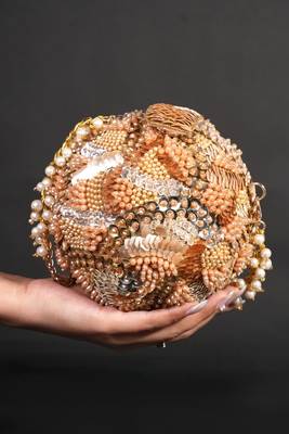 Amna gold suede embellished round bag 3