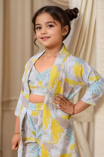 Yellow printed sleeveless crop top and shorts with shrug co-ords for girls