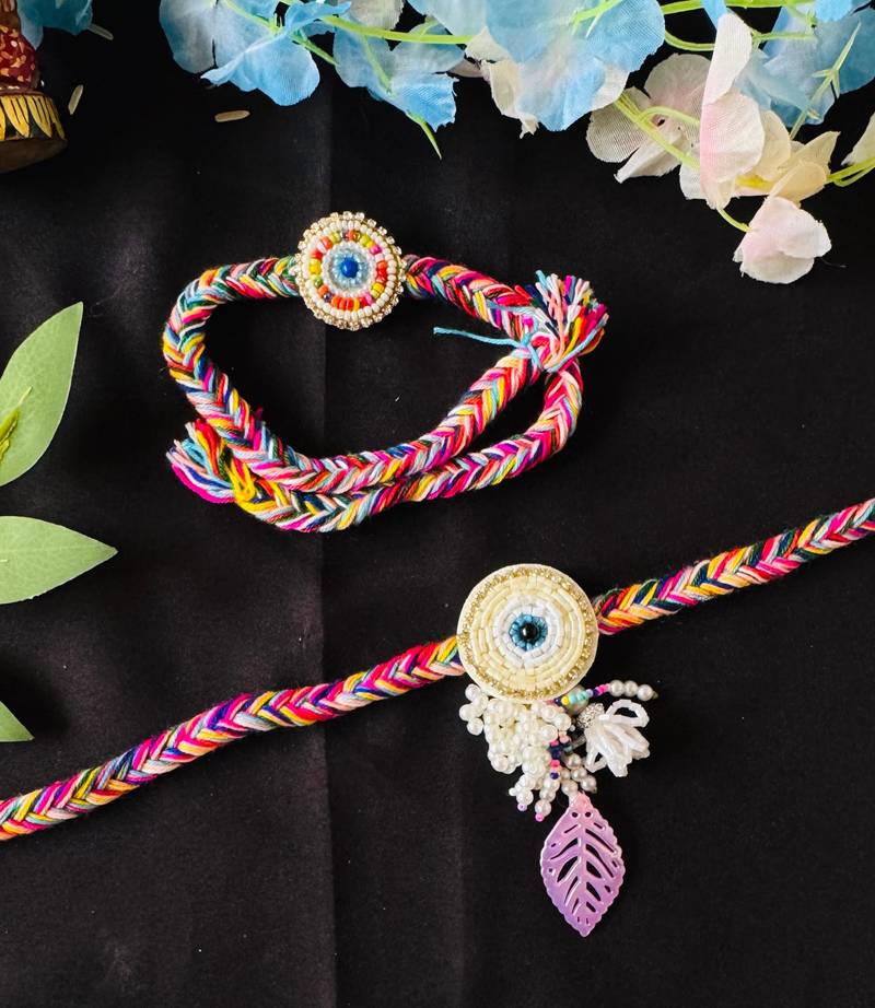 Vibrant Multicolor Thread Bhaiya Bhabhi Rakhi Set with Beads & Charm Accents