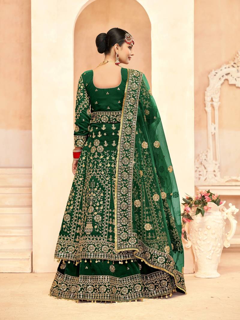 GREEN VELVET LONG TOP SALWAR SUIT WITH SKIRT