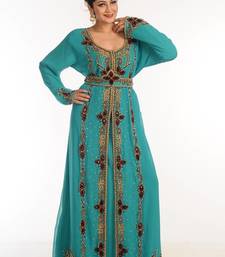 Turquoise georgette kaftan with zari work