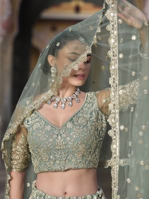 bridal wear net lehenga choli embroidery sequin work  2