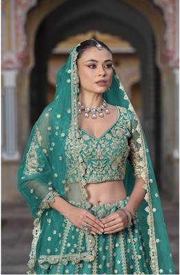 bridal wear net teal green lehenga choli embroidery sequin work  5