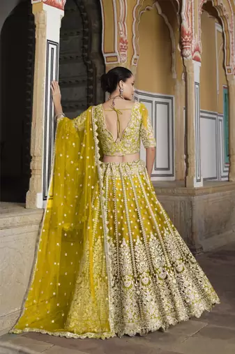 bridal wear net Yellow lehenga choli embroidery sequin work 