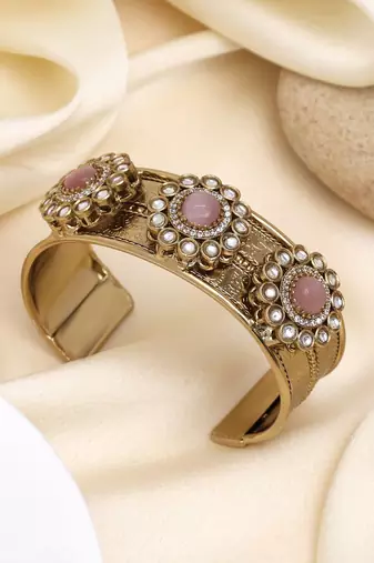 Vibrant pink color american diamond bracelet with  stone finish