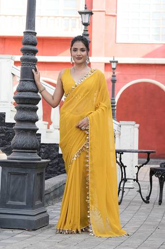Georgette yellow mirror work embellished sarees
