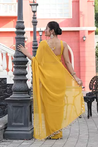 Georgette yellow mirror work embellished sarees