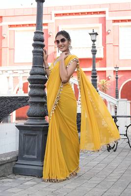 Georgette yellow mirror work embellished sarees 3