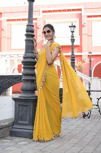 Georgette yellow mirror work embellished sarees