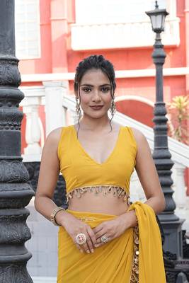 Georgette yellow mirror work embellished sarees 5