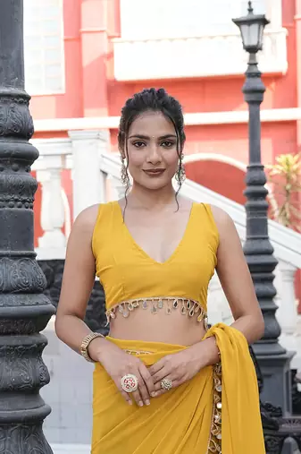 Georgette yellow mirror work embellished sarees