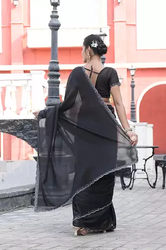 Silk blend black solid embellished stone work sarees