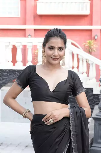 Silk blend black solid embellished stone work sarees
