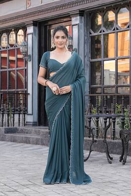 Silk blend teal solid embellished stone work sarees 1