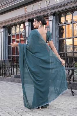Silk blend teal solid embellished stone work sarees 2