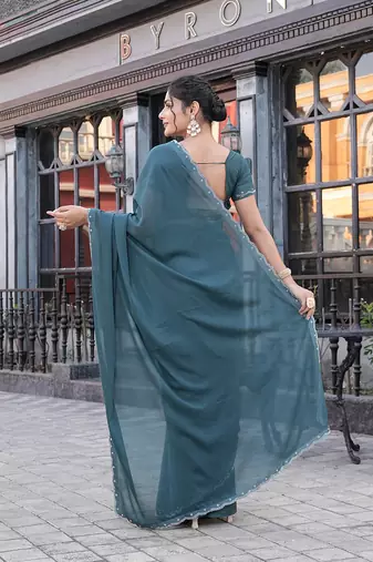 Silk blend teal solid embellished stone work sarees