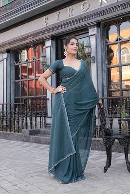 Silk blend teal solid embellished stone work sarees 3