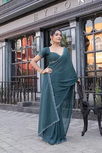 Silk blend teal solid embellished stone work sarees