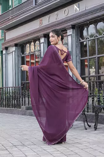 Silk blend wine solid embellished stone work sarees